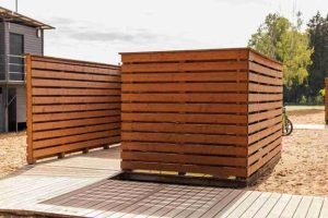 Modern horizontal cedar fence installed in a residential outdoor area